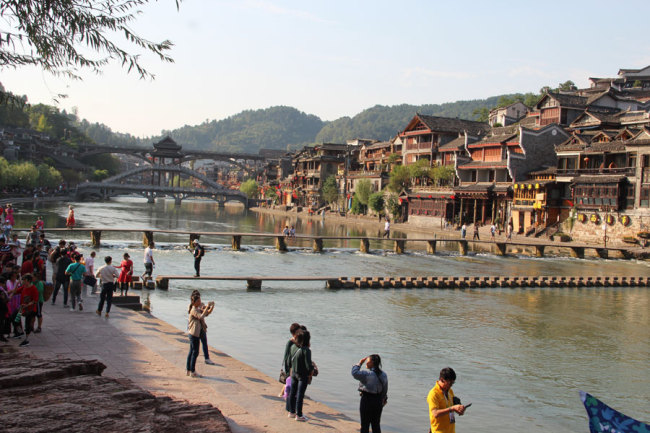 Fenghuang Ancient town and Tuojiang River are in Hunan. On the left of the river, the residence of Premier Xiong Xiling (Republic of China 1913-14) is located. [Photo courtesy of Melsam Ojha]