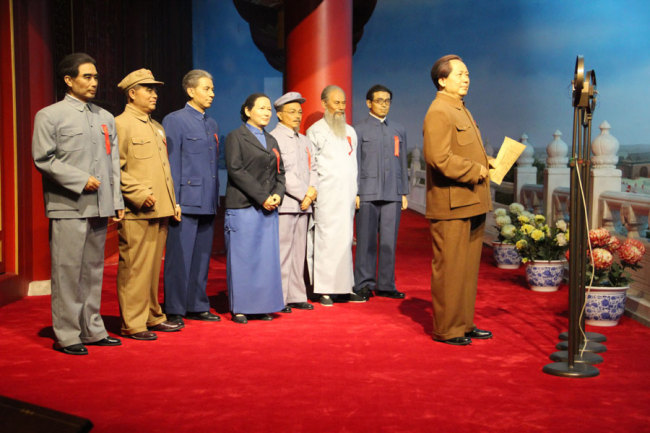 The mannequins designed in honor of Chairman Mao, Premier Zhou Enlai, Madam Soong ChingLing and other comrades on October 1, 1949 during the declaration of the founding of New China. [Photo courtesy of Melsam Ojha]